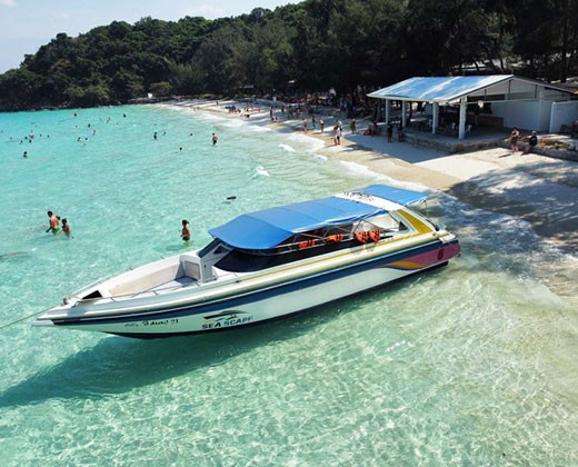 Visit Coral Island by joined speedboat with lunch